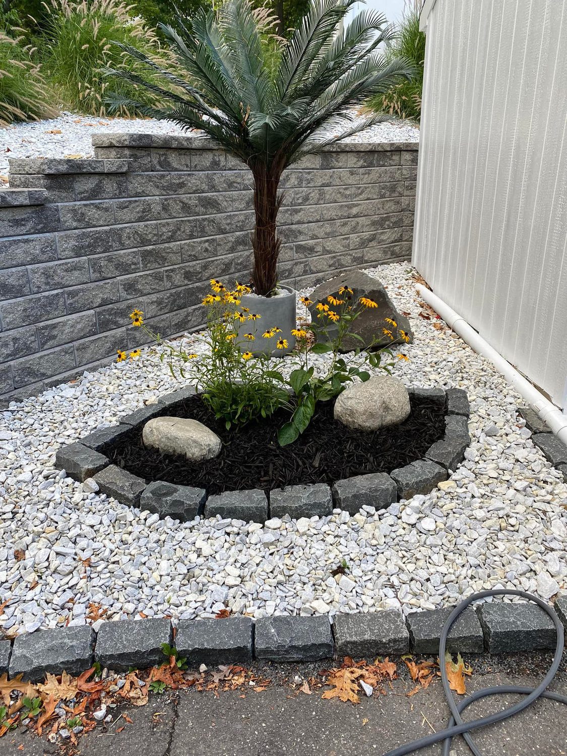 Boulder Garden Bed by TNT Masonry & Pavers in Connecticut