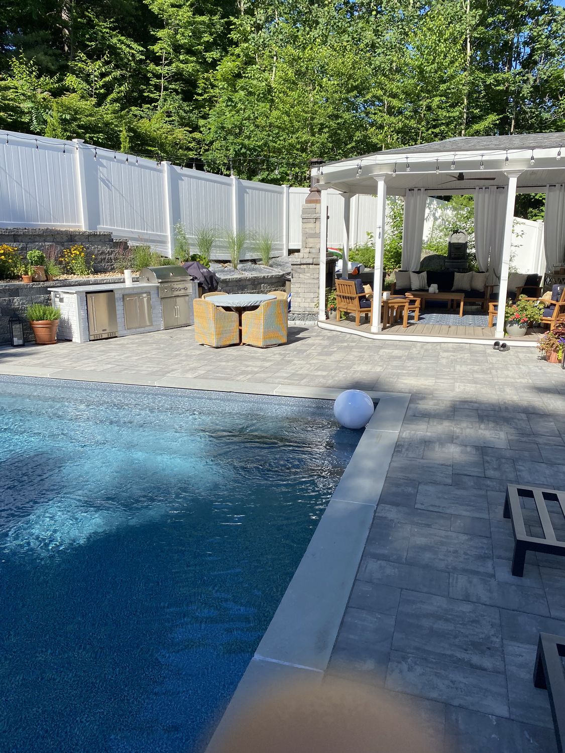Poolside Outdoor Living by TNT Masonry & Pavers in Connecticut