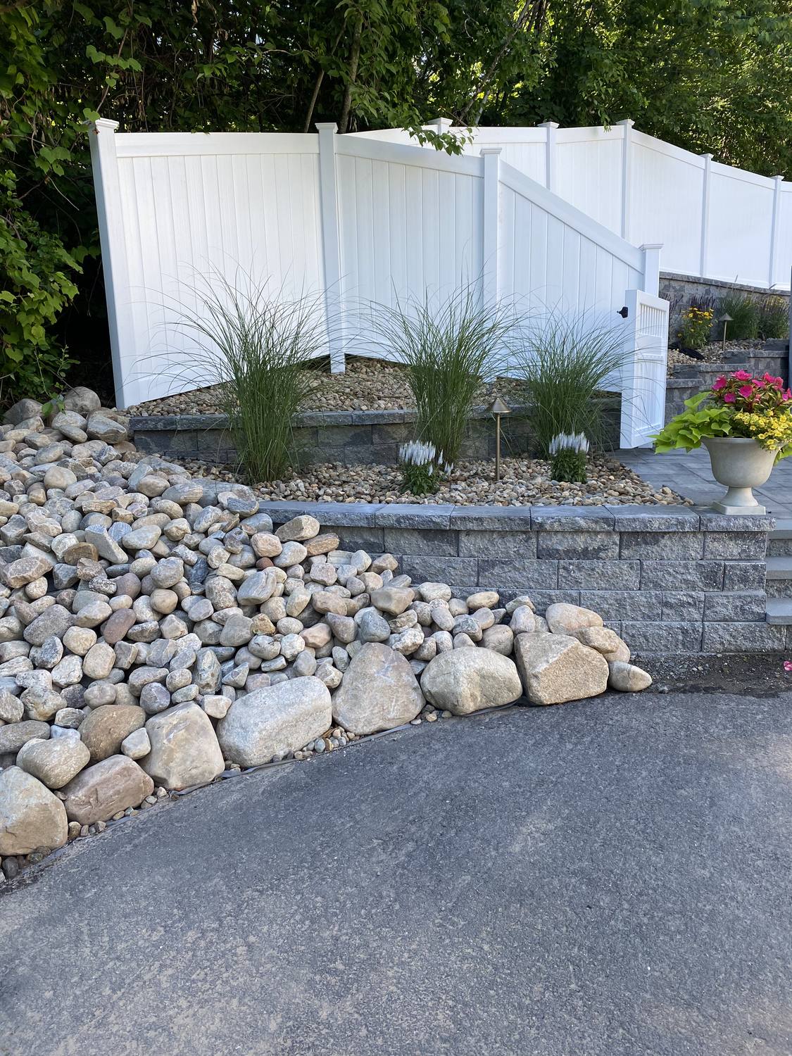 Boulder Slope and Rock Beds by TNT Masonry & Pavers in Connecticut