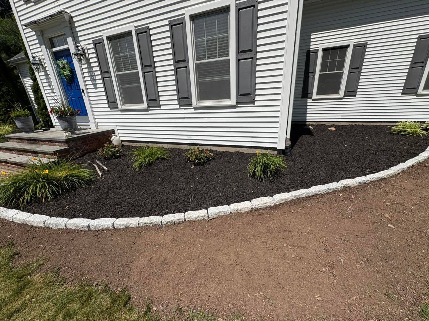 Cobble Edging and Beds by TNT Masonry & Pavers in Connecticut