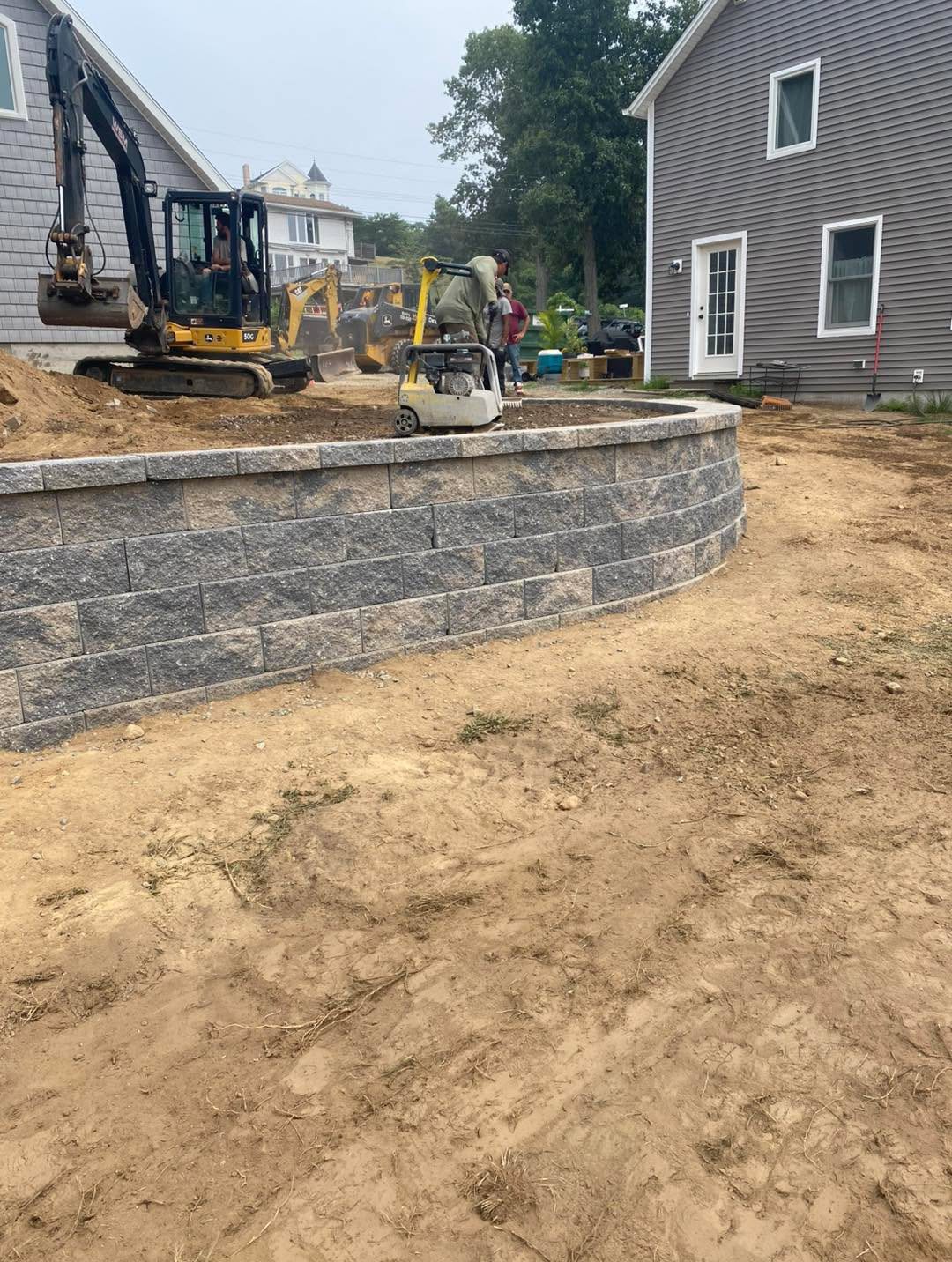 Curved Retaining Wall by TNT Masonry & Pavers in Connecticut